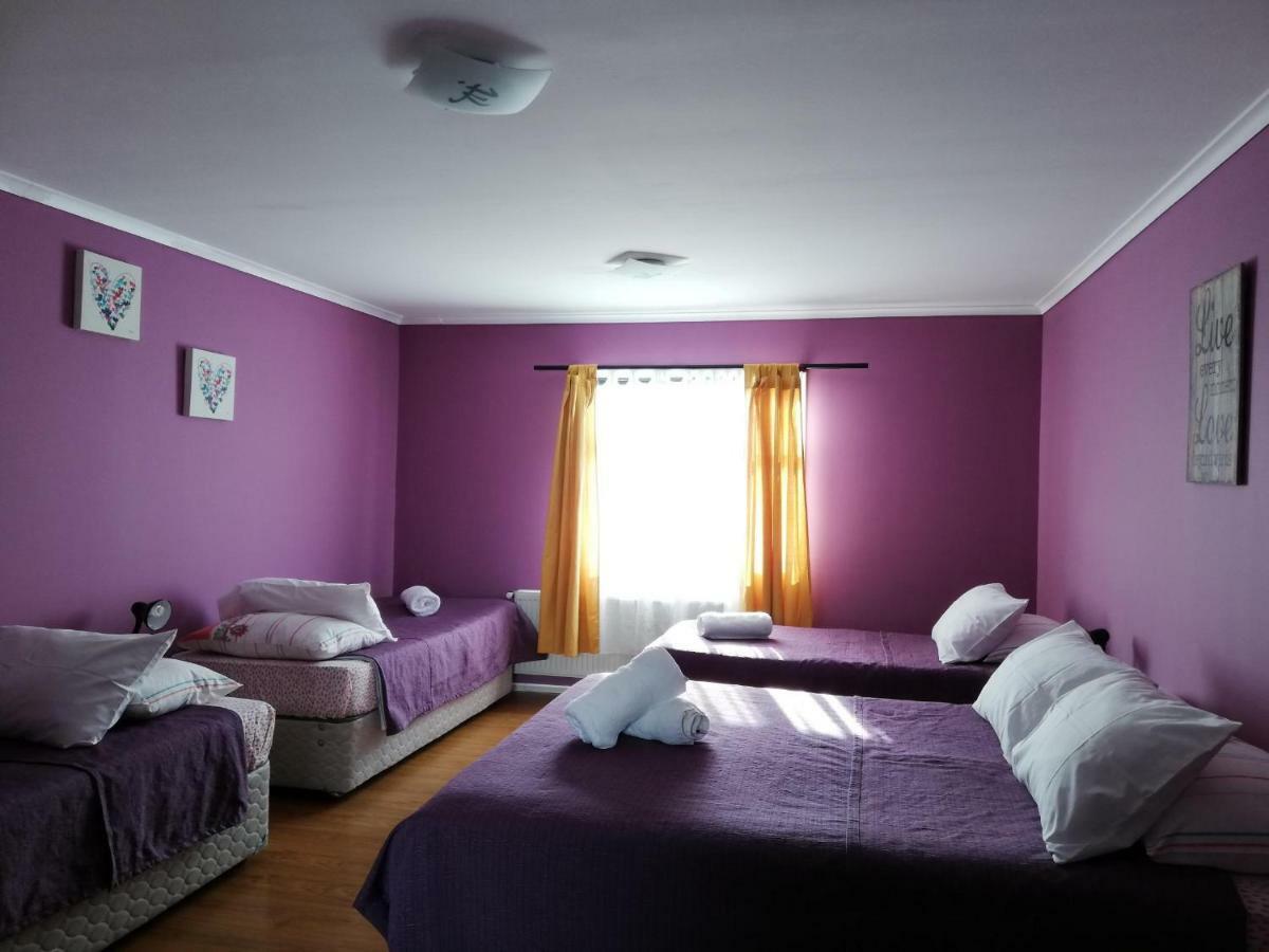 Hostal La Base Пуэрто-Наталес Экстерьер фото